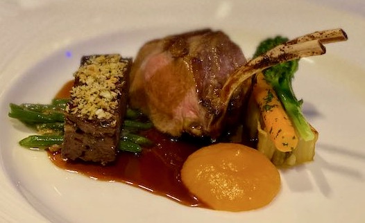 French trimmed lamb with pressed slow cooked shoulder of lamb with an apricot puree and gravy plus veg